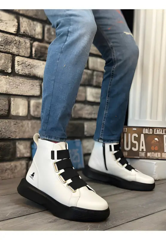 White high-top sneakers with black laces and soles.