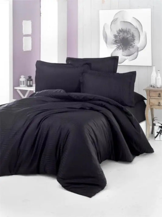 Black bedding set with duvet cover and pillowcases.