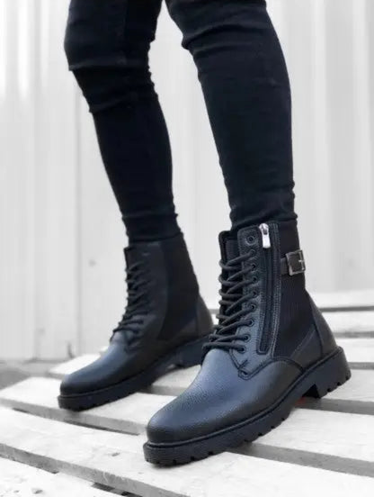 Black leather combat boots with side zippers and lace-up fronts.