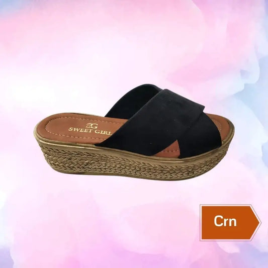 Black cross-strap platform sandal with an espadrille-style woven sole.