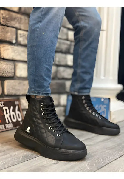 Black quilted high-top sneakers with thick soles and laces.