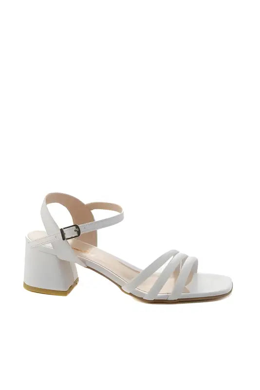 White strappy sandal with a chunky heel.