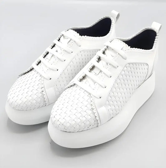 White woven leather sneakers with platform soles.