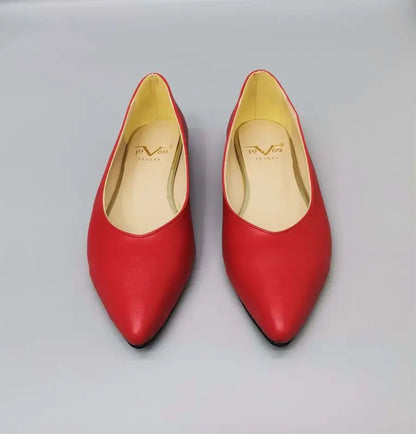 Red leather pointed-toe ballet flats.