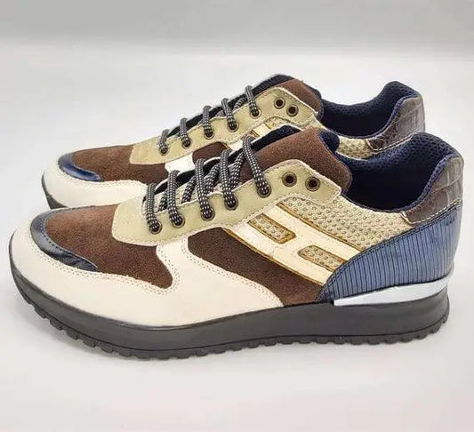 Athletic sneaker featuring brown, beige and navy blue color blocks with metallic accents.