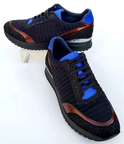 Black athletic sneakers with blue accents and brown trim.