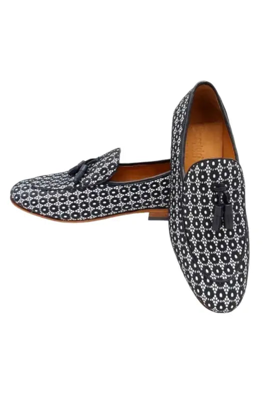 Patterned black and silver loafers with a geometric print design.