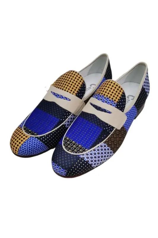 Patterned loafers featuring blue, gold, and black geometric designs with white penny straps.