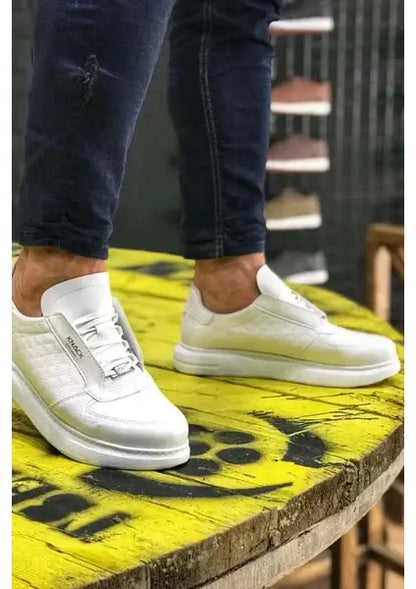 White leather sneakers with clean minimalist design.