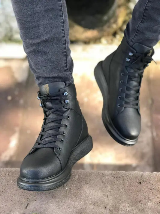 Black leather combat boots with laces and a chunky sole.