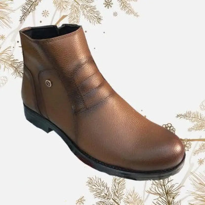 Brown leather ankle boot with a flat heel.