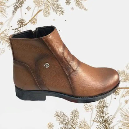 Brown leather ankle boot with a side zipper and black sole.