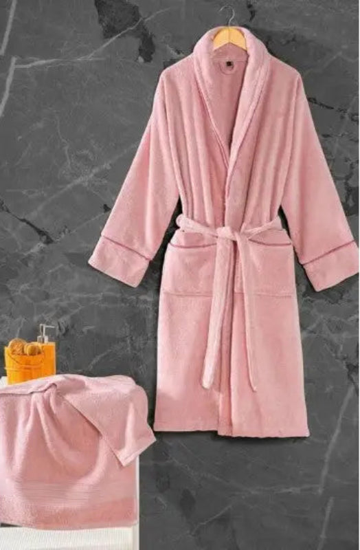 Soft pink bathrobe with a tie belt and front pockets.