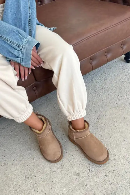 Tan suede Ugg boots.