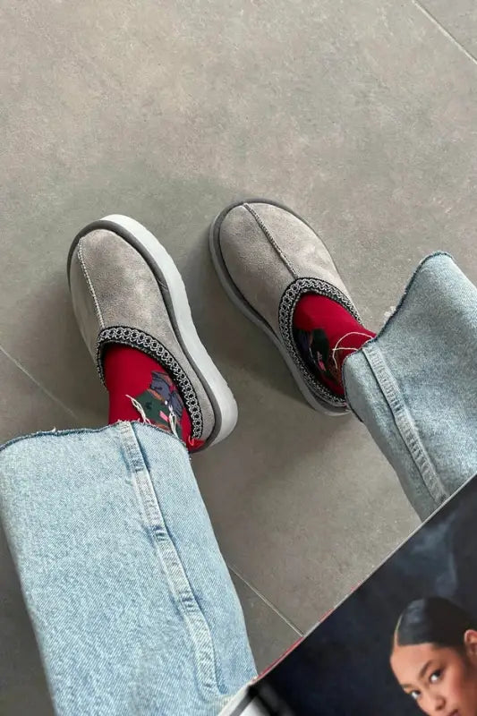 Gray suede platform slip-on shoes.