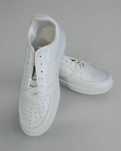 White perforated leather sneakers with laces.