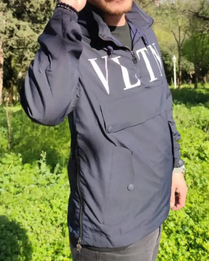 Navy blue hooded jacket with ’VLTN’ text across the chest.